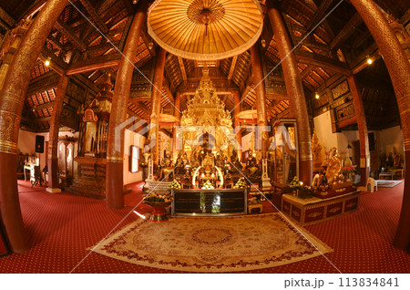 Luang Phor Phet, the principal Buddha image and beautiful Buddha statues that are hundreds of years old inside the chapel at Wat Phra That Chom Thong Worawihan. Located in Chiang Mai ,Thailand. 113834841