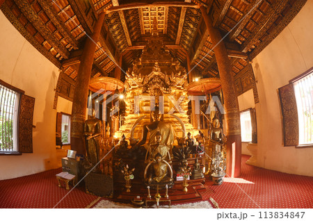 Luang Phor Phet, the principal Buddha image and beautiful Buddha statues that are hundreds of years old inside the chapel at Wat Phra That Chom Thong Worawihan. Located in Chiang Mai ,Thailand. 113834847