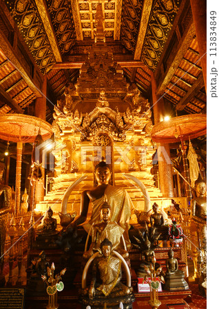 Luang Phor Phet, the principal Buddha image and beautiful Buddha statues that are hundreds of years old inside the chapel at Wat Phra That Chom Thong Worawihan. Located in Chiang Mai ,Thailand. Luang Phor Phet, the principal Buddha image and beautiful Buddha statues that are hundreds of years old inside the chapel at Wat Phra That Chom Thong Worawihan. Located in Chiang Mai ,Thailand. 113834849