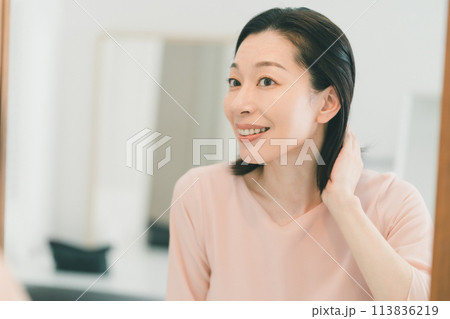a forty-something woman a forty-something woman 113836219