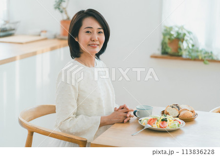 a forty-something woman a forty-something woman 113836228