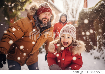 Happy family father and children play snowballs and enjoy the snow 113837220