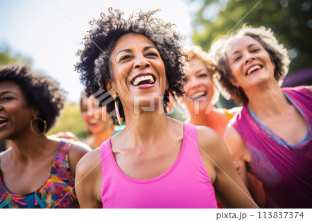 Attractive mature women having fun, dancing zumba or doing fitness in group training in gym Attractive mature women having fun, dancing zumba or doing fitness in group training in gym 113837374