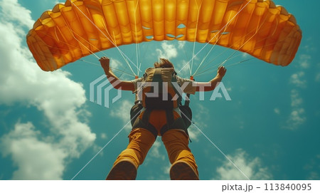 skydiver in cloudy sky 113840095