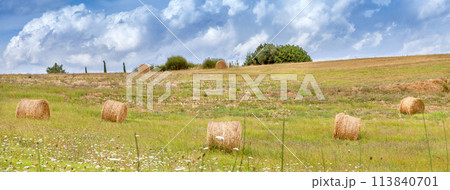 Rural landscapes of Tuscany Italy. Bales and haystacks on the hills and fields. Rural landscapes of Tuscany Italy. Bales and haystacks on the hills and fields. 113840701