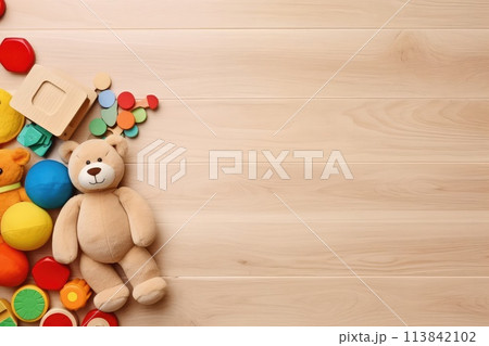 AI generated Top view of kids toys frame on wooden background with copy space. 113842102