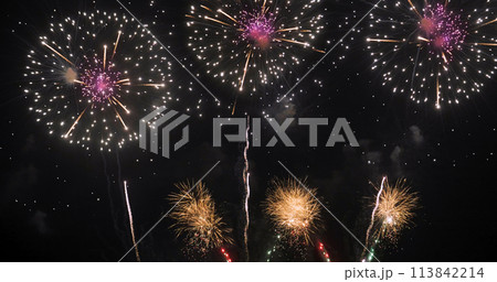 Golden Firework celebrate anniversary happy new year 2024, 4th of july holiday festival. Gold firework in the night time celebrate national holiday. Countdown to new year 2023 gold party time event 113842214