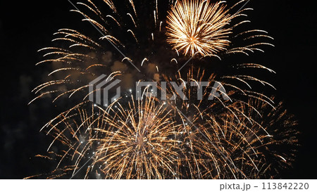 Golden Firework celebrate anniversary happy new year 2023, 4th of july holiday festival. Gold firework in the night time celebrate national holiday. Countdown to new year 2023 gold party time event 113842220