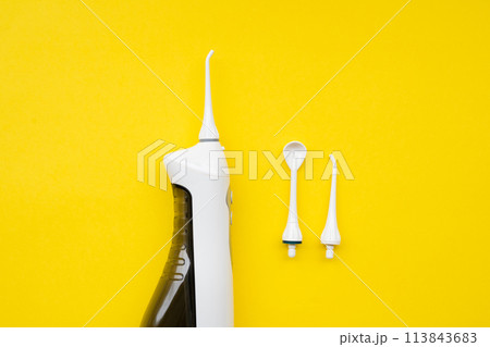 Mouth aerator on a yellow background with different nozzles. View from above Mouth aerator on a yellow background with different nozzles. View from above 113843683