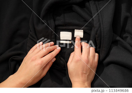 Warm stylish clothes with blank white label Warm stylish clothes with blank white label 113849686