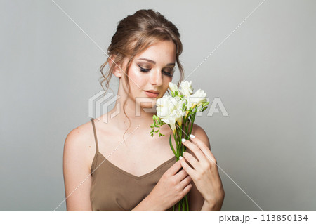 Beautiful woman with perfect clear fresh skin. Happy female model  113850134