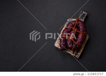 Delicious black blood sausage or black pudding with spices and herbs Delicious black blood sausage or black pudding with spices and herbs 113851717