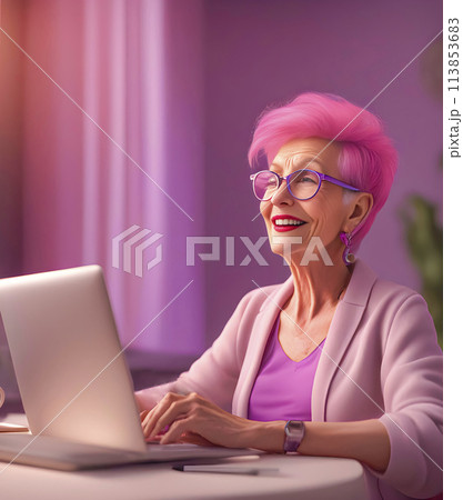 Portrait of an active bright business elderly woman working on a laptop 113853683