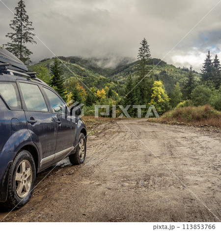 car for traveling with a mountain road 113853766