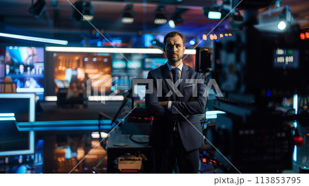 Confident News Anchor Preparing for Broadcast 113853795