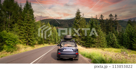 car for traveling with a mountain road 113853822