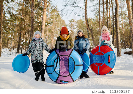 Friendly children with tubes and slides 113860187