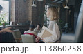Man and woman business partners meeting in creative office shaking hands and talking. Professional meeting and successful start-up concept. 113860258
