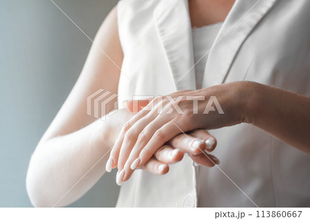 Women washing hands with antibacterial sanitizer gel. Hygiene concept. Prevent the spread of germs and bacteria and avoid infections corona virus 113860667