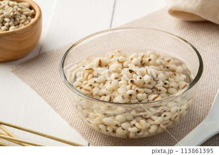 Job's tears in syrup,Boiled millet with sugar in glass bowl. 113861395