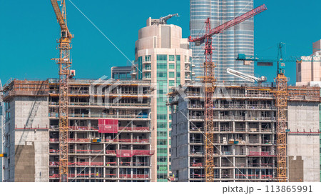 Construction of new modern skyscrapers in luxury Dubai city, United Arab Emirates Construction of new modern skyscrapers in luxury Dubai city, United Arab Emirates 113865991
