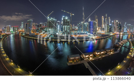 Night city Dubai near canal aerial timelapse Night city Dubai near canal aerial timelapse 113866040