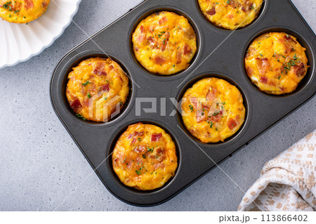 Egg muffins with bacon and cheddar, egg bites for breakfast Egg muffins with bacon and cheddar, egg bites for breakfast 113866402