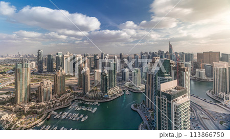 Dubai Marina skyscrapers and jumeirah lake towers view from the top aerial timelapse in the United Arab Emirates. 113866750