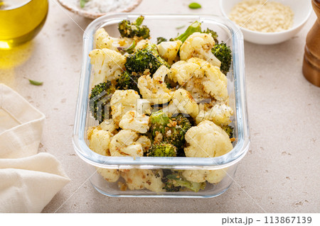Roasted cauliflower and broccoli in a meal prep container, healthy vegetable side dish Roasted cauliflower and broccoli in a meal prep container, healthy vegetable side dish 113867139