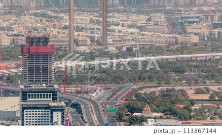 Aerial view to financial and zabeel district timelapse with traffic and under construction building with cranes from downtown 113867144