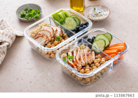Meal prep containers with healthy food prepped, cooked chicken, quinoa, chickpeas and eggs Meal prep containers with healthy food prepped, cooked chicken, quinoa, chickpeas and eggs 113867663