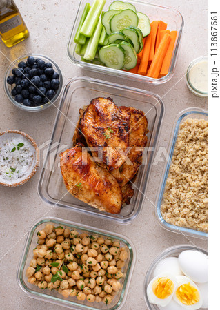 High protein healthy lunch meal prep in containers with chicken, quinoa, herbed chickpeas, vegetables and eggs High protein healthy lunch meal prep in containers with chicken, quinoa, herbed chickpeas, vegetables and eggs 113867681
