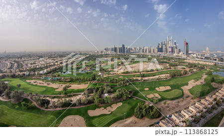 Dubai Marina skyscrapers and golf course morning timelapse, Dubai, United Arab Emirates 113868125