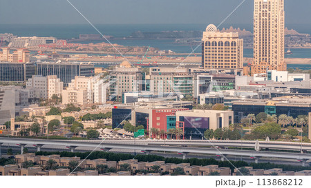 Dubai media city skyscrapers and golf course morning timelapse, Dubai, United Arab Emirates 113868212