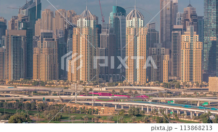 Dubai Marina skyscrapers and golf course morning timelapse, Dubai, United Arab Emirates 113868213