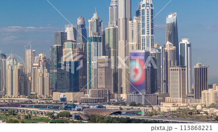 Dubai Marina skyscrapers and golf course morning timelapse, Dubai, United Arab Emirates Dubai Marina skyscrapers and golf course morning timelapse, Dubai, United Arab Emirates 113868221