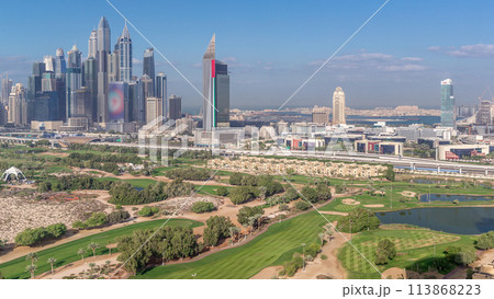 Dubai Marina skyscrapers and golf course morning timelapse, Dubai, United Arab Emirates 113868223