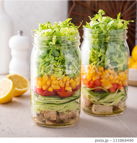 Salad meal prep in a jar, vegetables and corn salad with chicken Salad meal prep in a jar, vegetables and corn salad with chicken 113868490