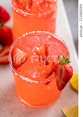 Strawberry margarita cocktail with lime and crushed ice Strawberry margarita cocktail with lime and crushed ice 113868564