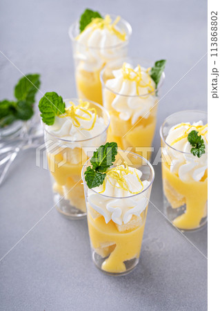 Lemon curd layered dessert shots for a party 113868802