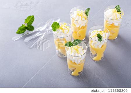 Lemon curd layered dessert shots for a party 113868803