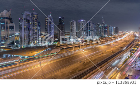 Aerial top view to Sheikh Zayed road near Dubai Marina and JLT timelapse, Dubai. 113868933