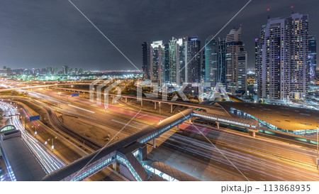 Aerial top view to Sheikh Zayed road near Dubai Marina and JLT timelapse, Dubai. 113868935