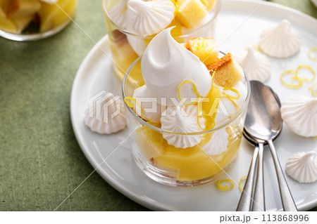 Lemon meringue and pound cake trifle in a glass 113868996