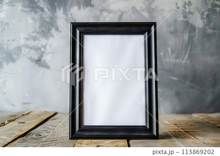 Picture frame rests on table, showcasing art in room, mockup 113869202