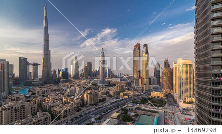 Dubai Downtown skyline day to night timelapse with Burj Khalifa and other towers paniramic view from the top in Dubai Dubai Downtown skyline day to night timelapse with Burj Khalifa and other towers paniramic view from the top in Dubai 113869298