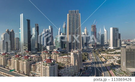 Skyline view of the buildings of Sheikh Zayed Road and DIFC timelapse in Dubai, UAE. 113869426