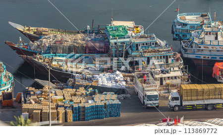 Loading a ship in Port Said timelapse in Dubai, UAE. Loading a ship in Port Said timelapse in Dubai, UAE. 113869772