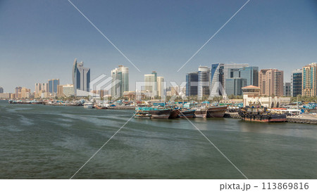 Trading wooden boats in the port timelapse. Merchant ships on the Creek Canal. Trading wooden boats in the port timelapse. Merchant ships on the Creek Canal. 113869816