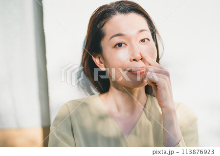 a forty-something woman a forty-something woman 113876923